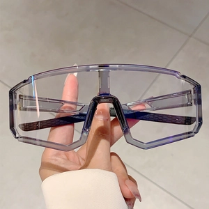 Macro shot of futuristic grey cycling eyewear featuring anti-slip temples and geometric frame
