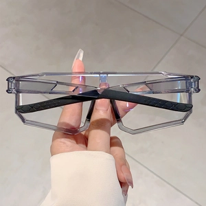 Detail of photochromic cycling sunglasses with grey frame and non-slip black temples