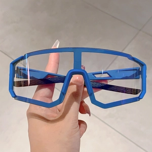 Detail of blue frame cycling glasses with honeycomb anti-slip texture on temple