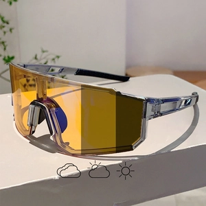 Detail of photochromic cycling sunglasses showing lens color transition on a white stand