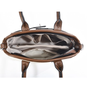 Internal view of the crossbody bag showing multiple compartments and herringbone lining