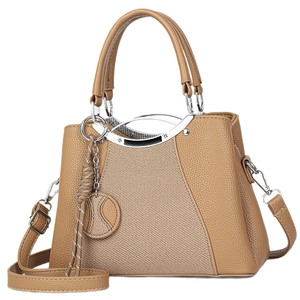 Camel brown leather handbag with textured fabric panels and silver metallic hardware decor