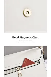 Detail of gold magnetic closure and back zipper pocket on white leather crossbody bag