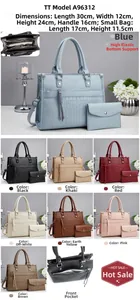 Detail view of large crocodile embossed leather handbag with matching clutch in 8 colors