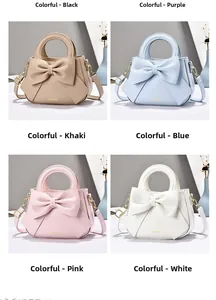 Detail view of stylish bow handbag in khaki, blue, pink, and white matte leather