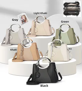 Litchi leather handbags in 6 colors with metal ring handles and tassel charms