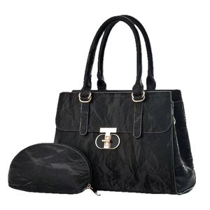 Fashionable black textured tote bag set with matching coin purse and gold hardware locks