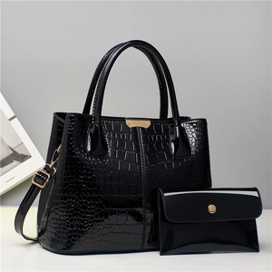 Fashionable black crocodile embossed patent leather handbag and crossbody pouch set