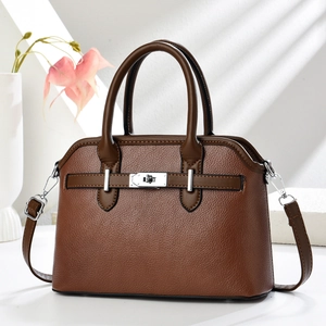 Deep brown lychee pattern leather shell bag with silver buckle and top handle