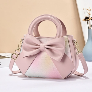 Handtasche mit pinkem Farbverlauf, 3D-Schleife und Blumen-Kleeblatt-Prägung