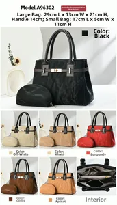 Detailed view of the multi-compartment interior layout for this tote and pouch set