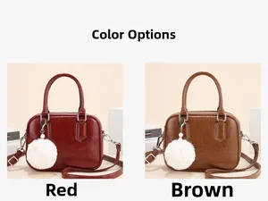 Red and brown retro mini Boston bags with glossy oil wax finish and plush pompom charm
