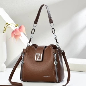 Deep brown lychee pattern leather handbag with silver geometric buckle and chain handle
