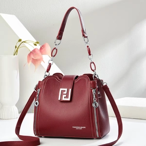 Burgundy lychee pattern leather handbag with silver chain and adjustable shoulder strap
