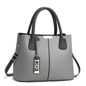 Chic grey and black leather tote bag with lychee texture and adjustable shoulder strap