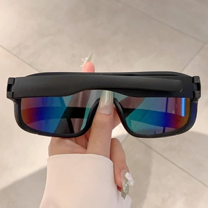 Detailed view of matte black sports sunglasses with large colorful gradient mirrored lenses