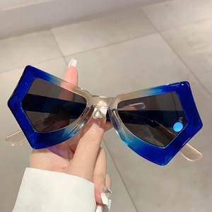Oversized butterfly sunglasses with blue gradient frames and dark grey lenses for women