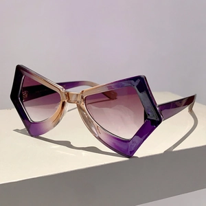 Detailed view of purple pentagon sunglasses with gradient lenses on a white pedestal