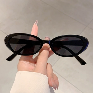 Lunettes de soleil œil de chat ovales noires classiques avec monture en résine