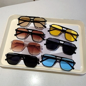 Retro square pilot sunglasses collection with metal rivets and various colorful ocean lenses