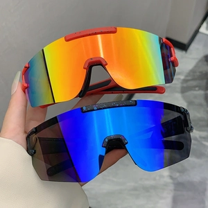 Detail of colorful cycling sunglasses with splatter pattern frames and reflective lenses
