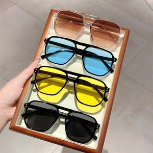 Vintage square sunglasses set with stylish ocean lenses and rivet accents in multiple colors