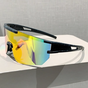 Detail of colorful mirrored lens and speckled black frames on cycling sports sunglasses
