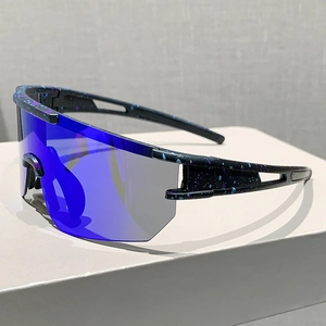 Detail of cycling sunglasses with black frame, blue splash paint and mirrored lens