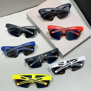 Colorful sports sunglasses with large integrated lenses and splatter-painted frames