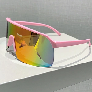Close-up of pink sports sunglasses with colorful gradient mirror lens for outdoor cycling