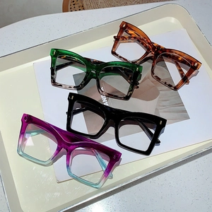 Set of four oversized butterfly frames in tortoiseshell, green, black and purple gradient