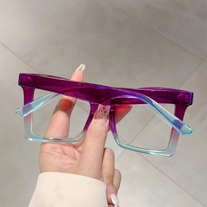 Close-up of stylish purple and blue gradient butterfly frame anti-blue light glasses