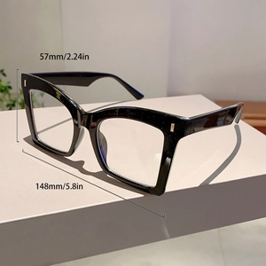 Detailed view of black butterfly frame glasses with gold accents and size specifications