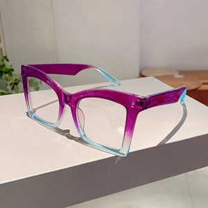 Detail view of butterfly frame eyeglasses with purple to cyan gradient translucent finish