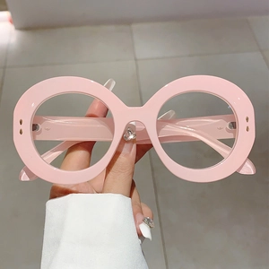 Pink oversized round blue light blocking glasses with vintage frame and gold accents