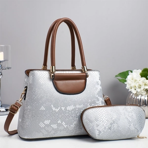 Fashion silver snakeskin tote bag with matching inner pouch and gold hardware