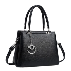Classic black leather handbag with lychee texture, silver chain charm and crossbody strap