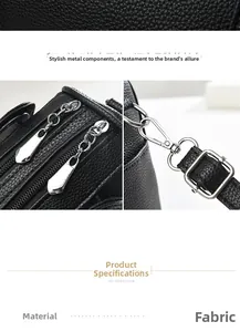 Close-up of black lychee texture fabric with silver polished metal zippers and hooks