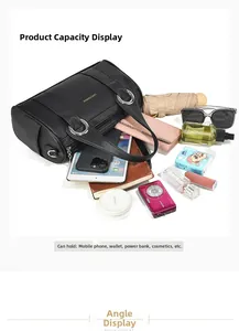 Capacity display of black litchi leather handbag showing interior space and essentials