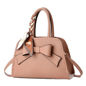 Elegant dusty pink bow handbag with litchi texture and fashion printed silk scarf wrap