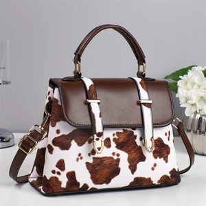 Elegant square crossbody handbag with brown animal print and premium gold hardware accents