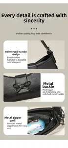 Detail view of reinforced handle, silver bow hardware, and smooth metal zipper on black bag