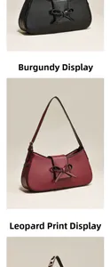 Detail of leopard print and glossy burgundy handbags featuring chic bow decoration