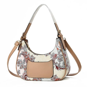 Bohemian paisley hobo bag with adjustable brown shoulder straps and gold hardware