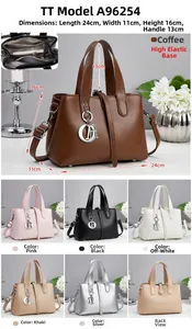 Detail view of stylish tote bag with CD charm and internal storage dimensions