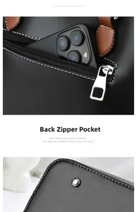 Detail of rear zipper pocket on leather tote bag showing capacity for smartphone storage