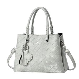 Silver-grey woven texture women's tote bag with dual knotted handles and crossbody strap
