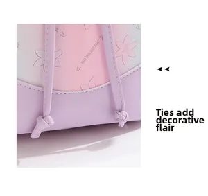 Detail of floral embossed leather on backpack with decorative drawstring cords