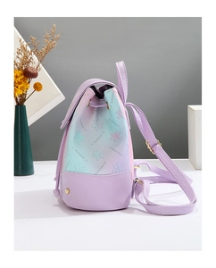 Detail of lavender gradient mini backpack with floral print and gold metal studs