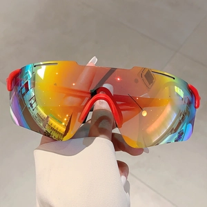 Detail of red sports sunglasses with gradient orange-red mirror lenses and UV protection